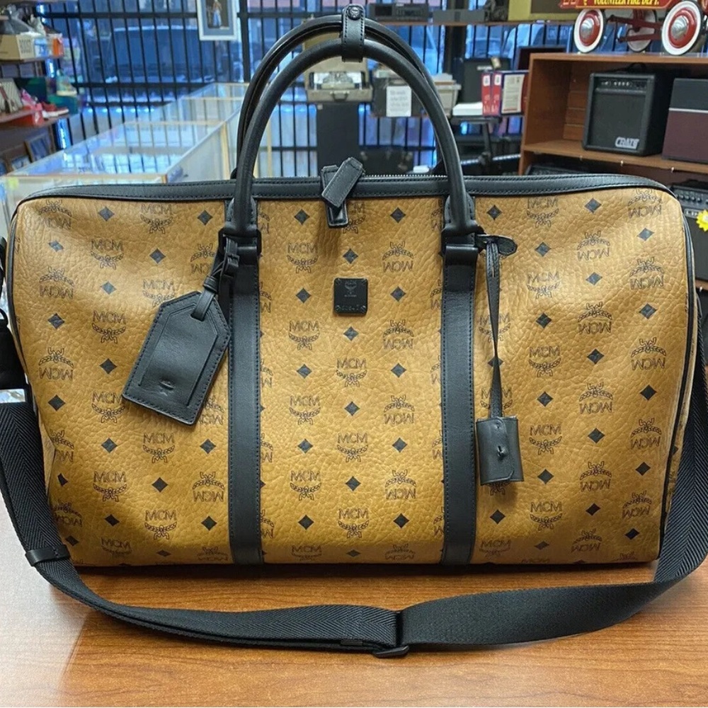 MCM Ottomar Weekender Large Travel Bag Duffel Visetos and Nappa Leather Cognac